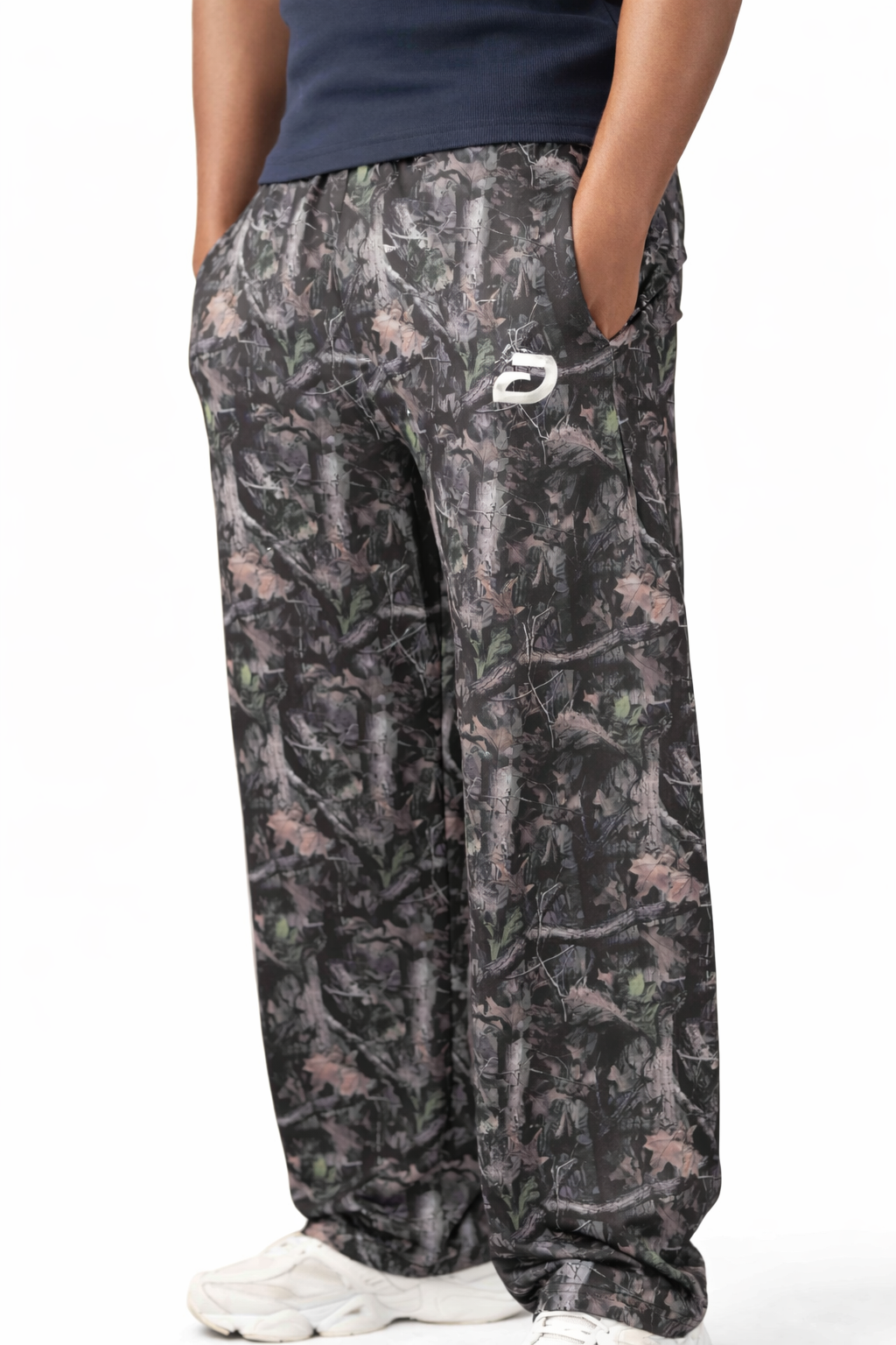 Dark Camouflage pants with a brand logo on a white background